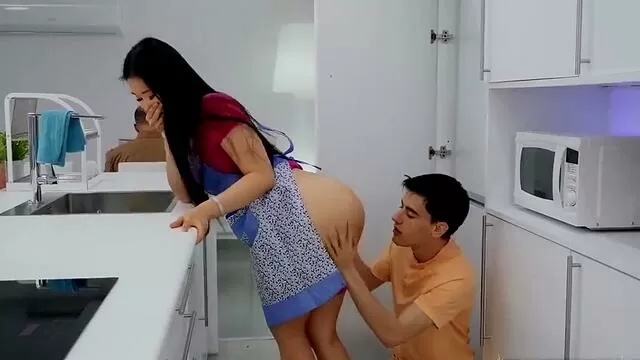 Horny brother licking his sister's cunt behind his father's back in the  kitchen - PORNVOV